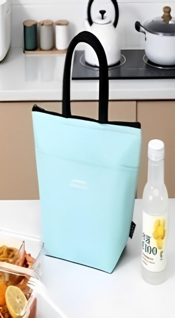 Office worker with front pocket light blue lunch bag