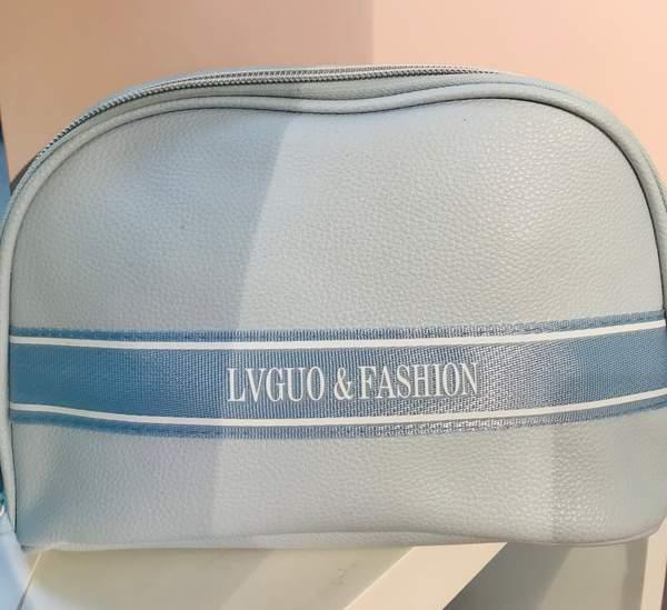 Litchi pattern woven belt semicircle makeup bag