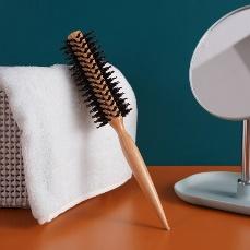 Bristle barrel style curly comb