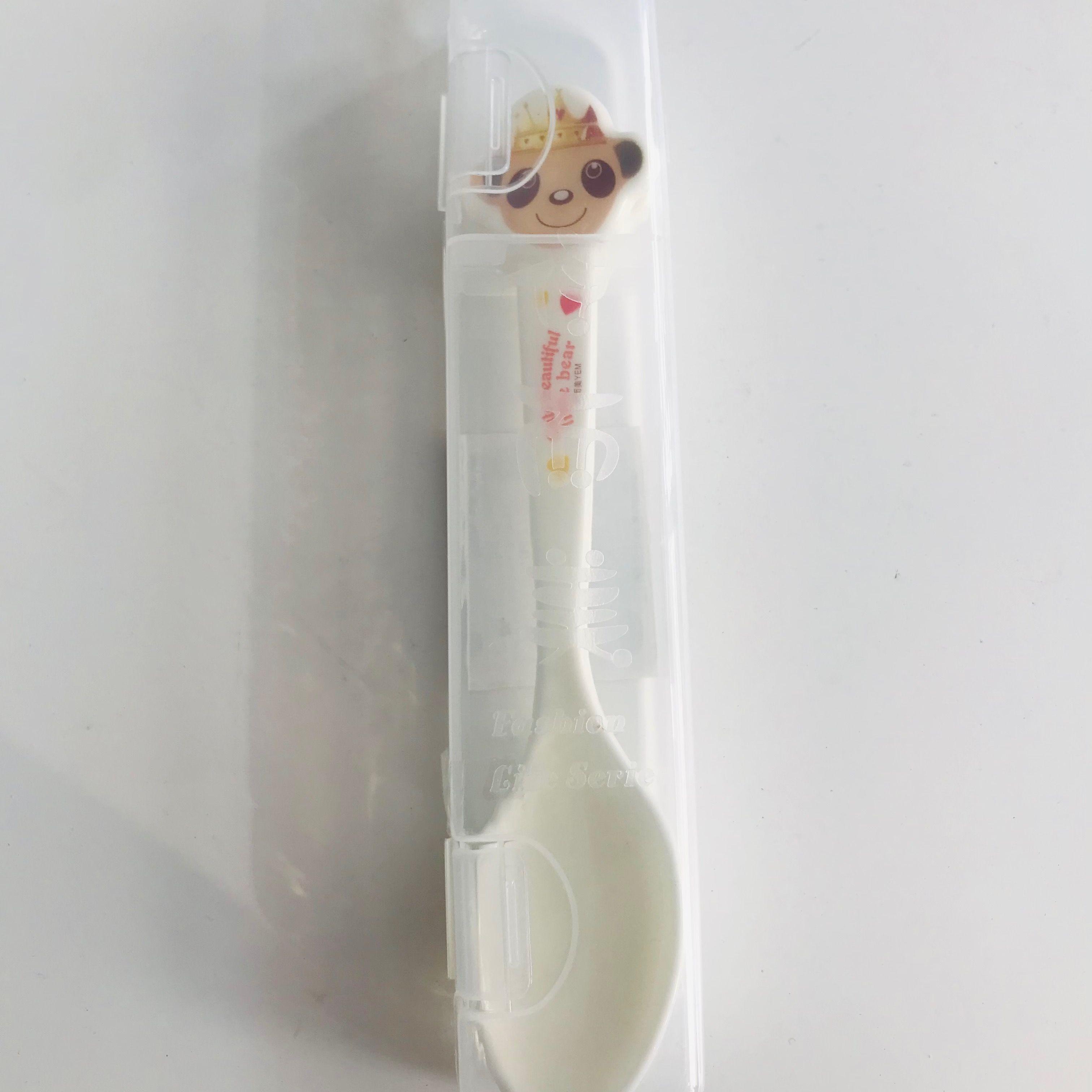 Boxed cartoon spoon