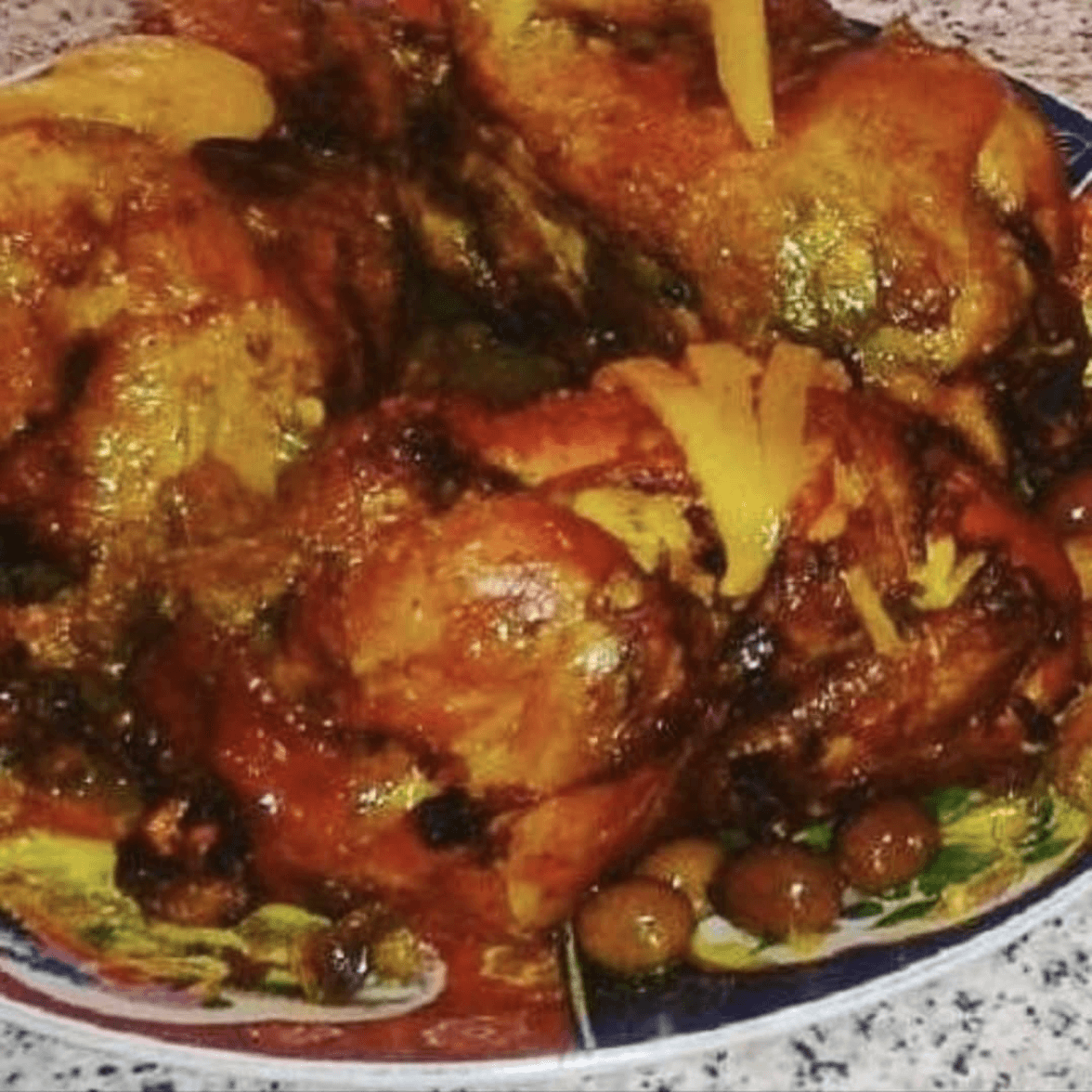 Tajine poulet, citrons confits, olives et amandes