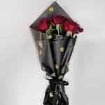 Trois roses rouges