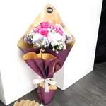 Bouquet de 10 roses coloriès.