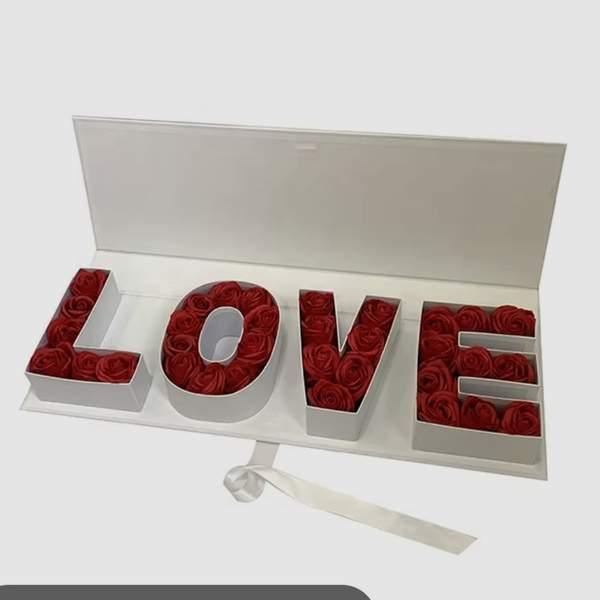 Un cadeau élégant de roses naturelles