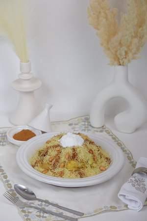 Seffa au sucre glace et amandes