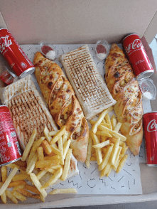 2 Tacos Escalope Grillée + 2 Baguettes Farcies Escalope Panée + 4 Sodas