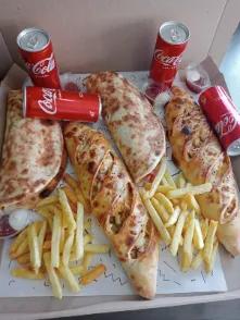 2 Makloubs Escalope Grillés + 2 Baguettes Farcies Escalope Panée + 4 sodas