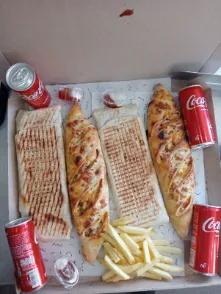 2 Tacos XL Escalope Panée + 2 Baguettes Farcies Escalope Grillée + 4 sodas