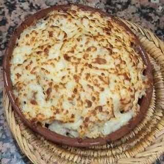 Pasticcio Cooking On Charcoal